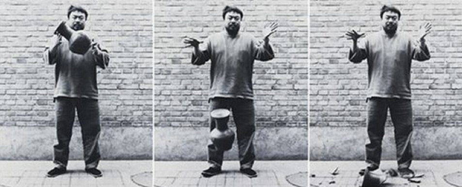 man dropping ancient urn